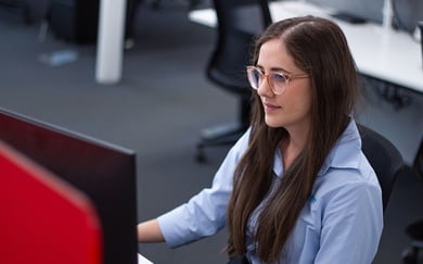 Jess-working-at-desk-Addinsight